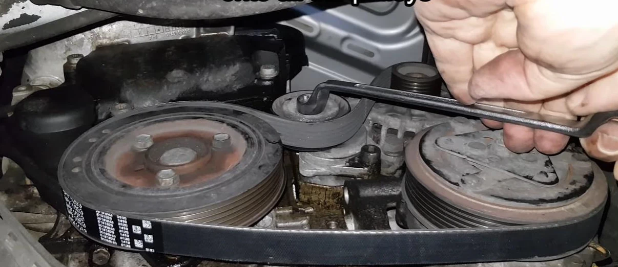 пежо 307 снятие ремня генератора. Ослабить натяжитель.